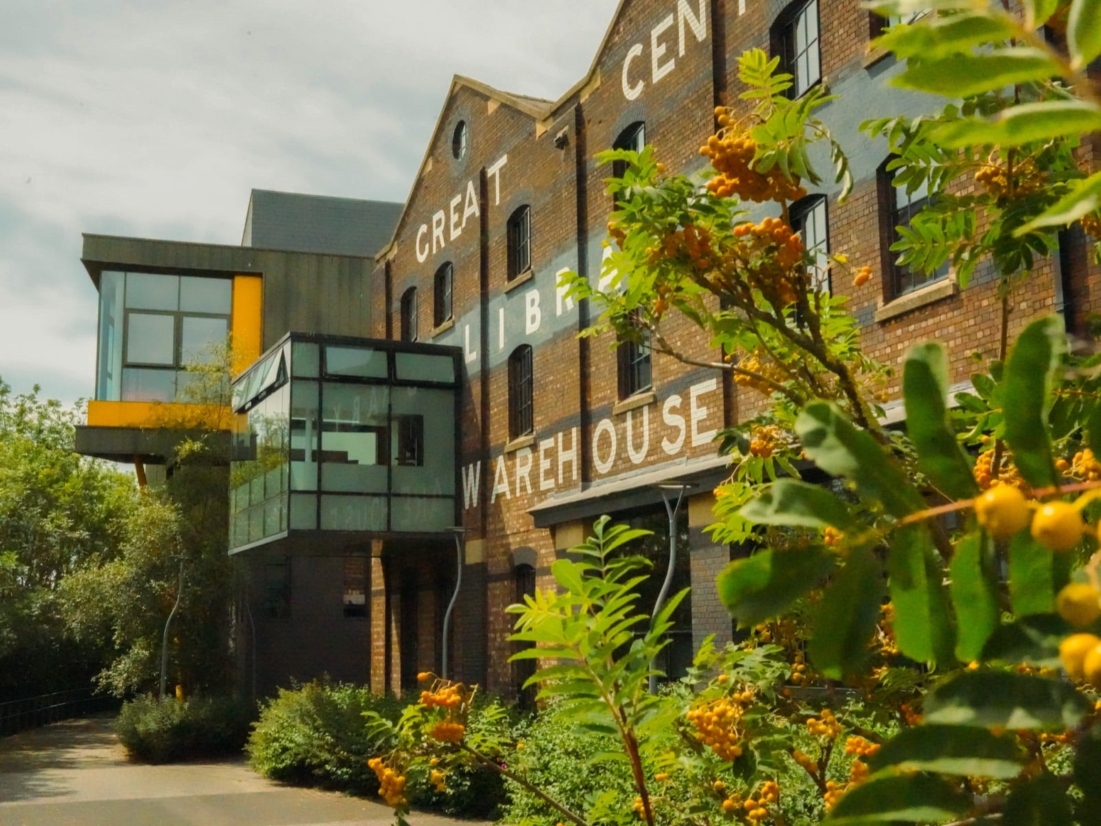 The Great Central Warehouse Library, a converted brick warehouse with its name painted across the facade